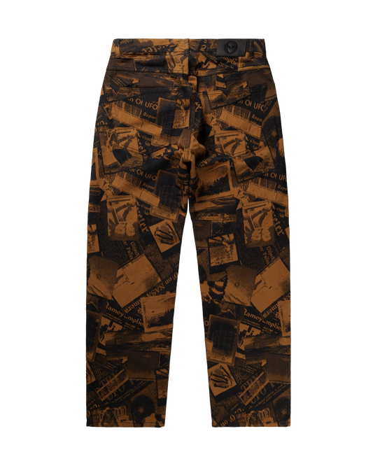 Trousers with a pattern of books on a white background