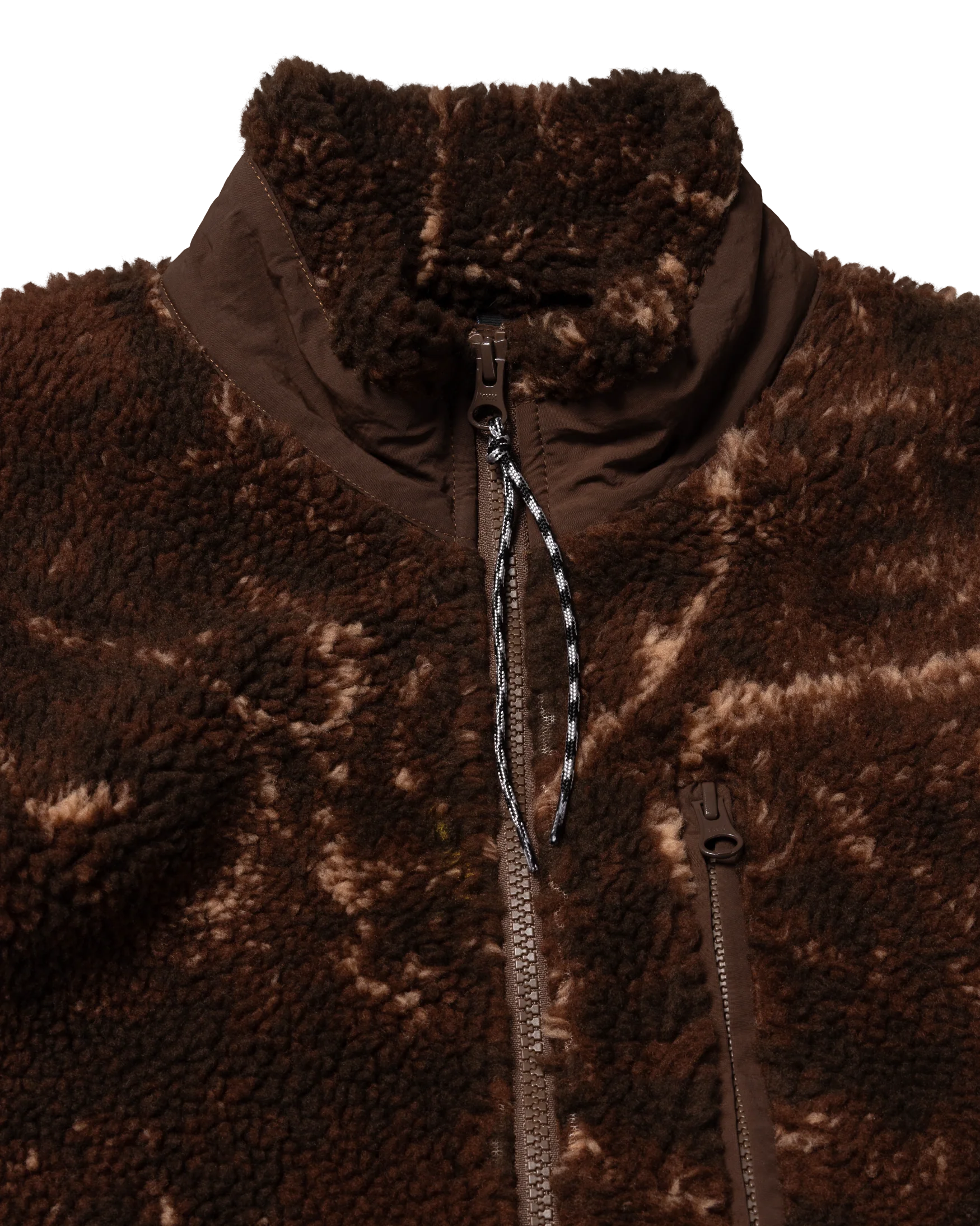 Close-up of a brown fleece jacket with a zipper on a white background