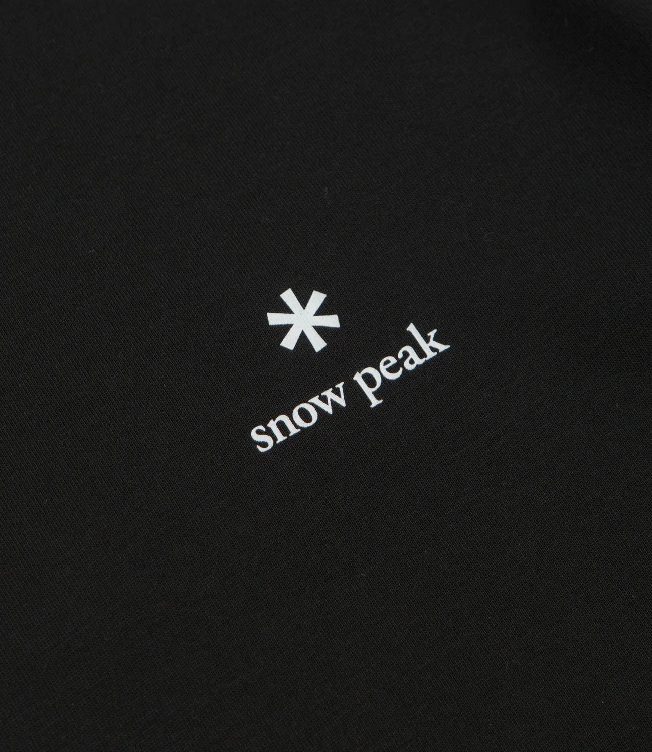 Snow Peak logo on a black background